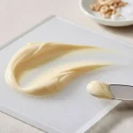 Close-up texture of ShaRique Skin Barrier Repair Cream showing rich lipid-dense consistency for skin healing.