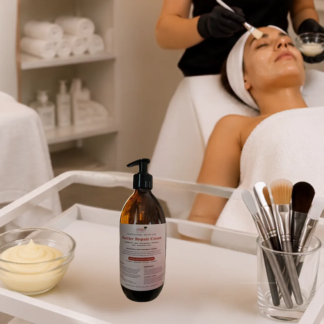 Esthetician finishing a professional facial with ShaRique barrier repair moisturiser in a salon treatment room